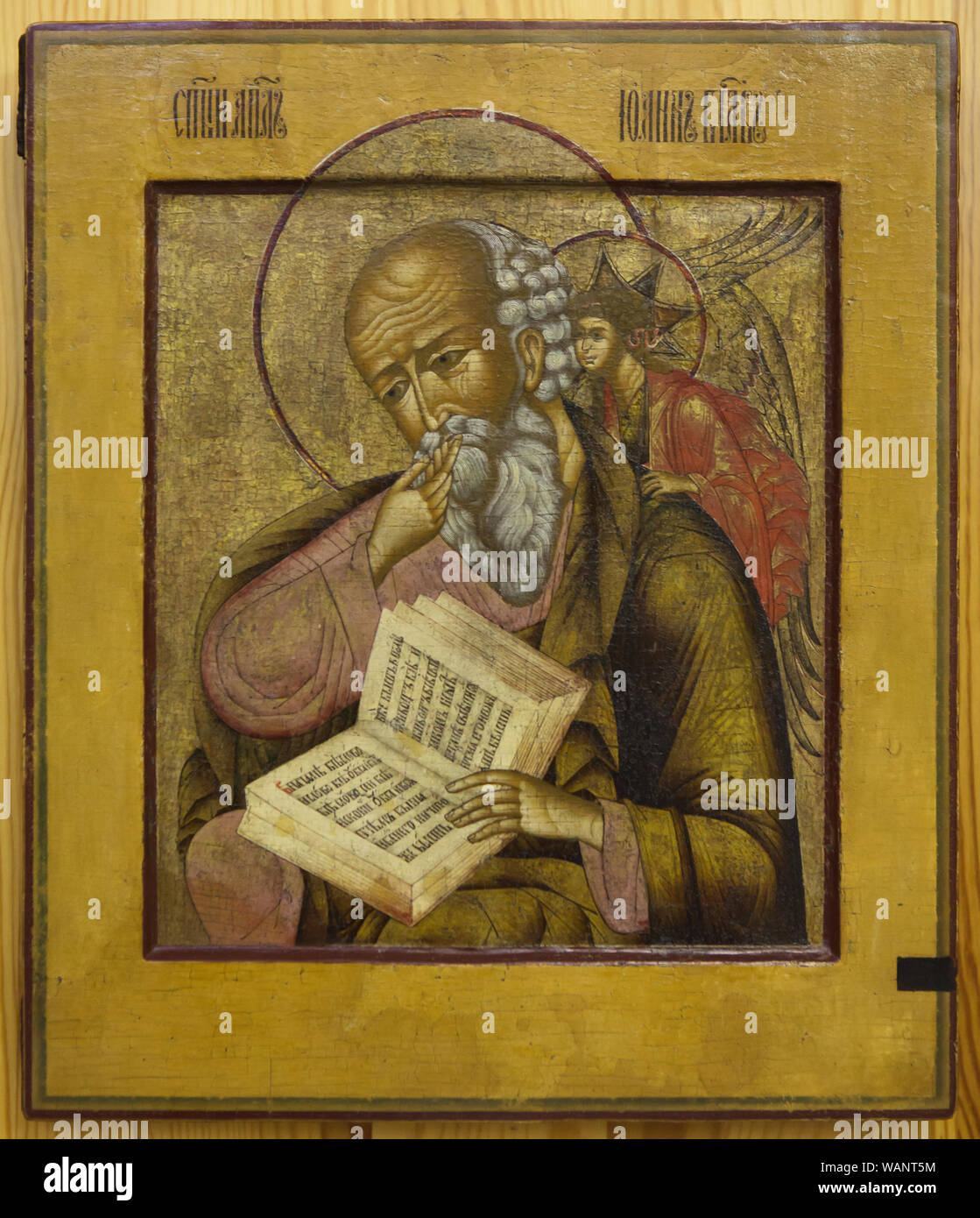 Saint John the Theologian in silence. Nevyansk icon dated from the first half of the 18th century on display in the Nevyansk Icon Museum (Nevyanskaya Ikona) in Yekaterinburg, Russia. Stock Photo