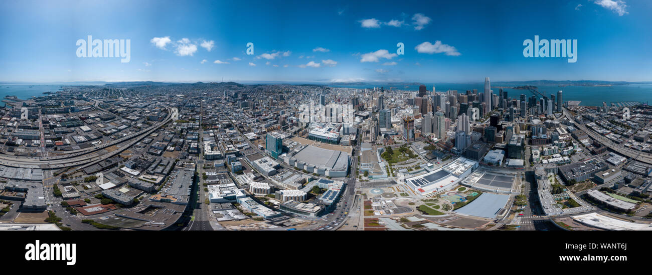 Aerial of San Francisco Downtown with skyscrapers surrounded by ocean ...