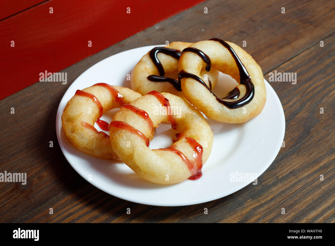 Fresh donuts with jam in the bakery for celebration Stock Photo Alamy