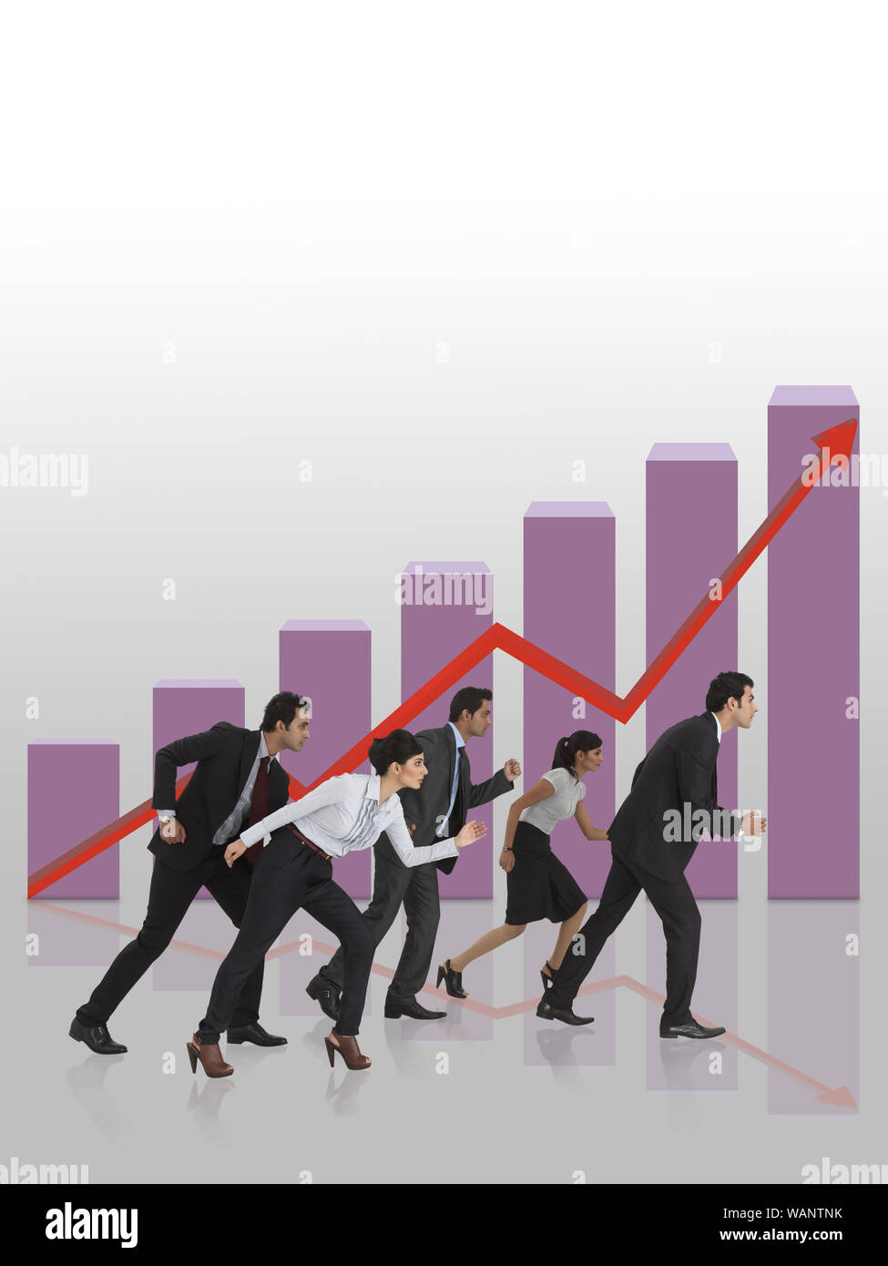 Business executives racing in front of bar graph rising upward Stock Photo