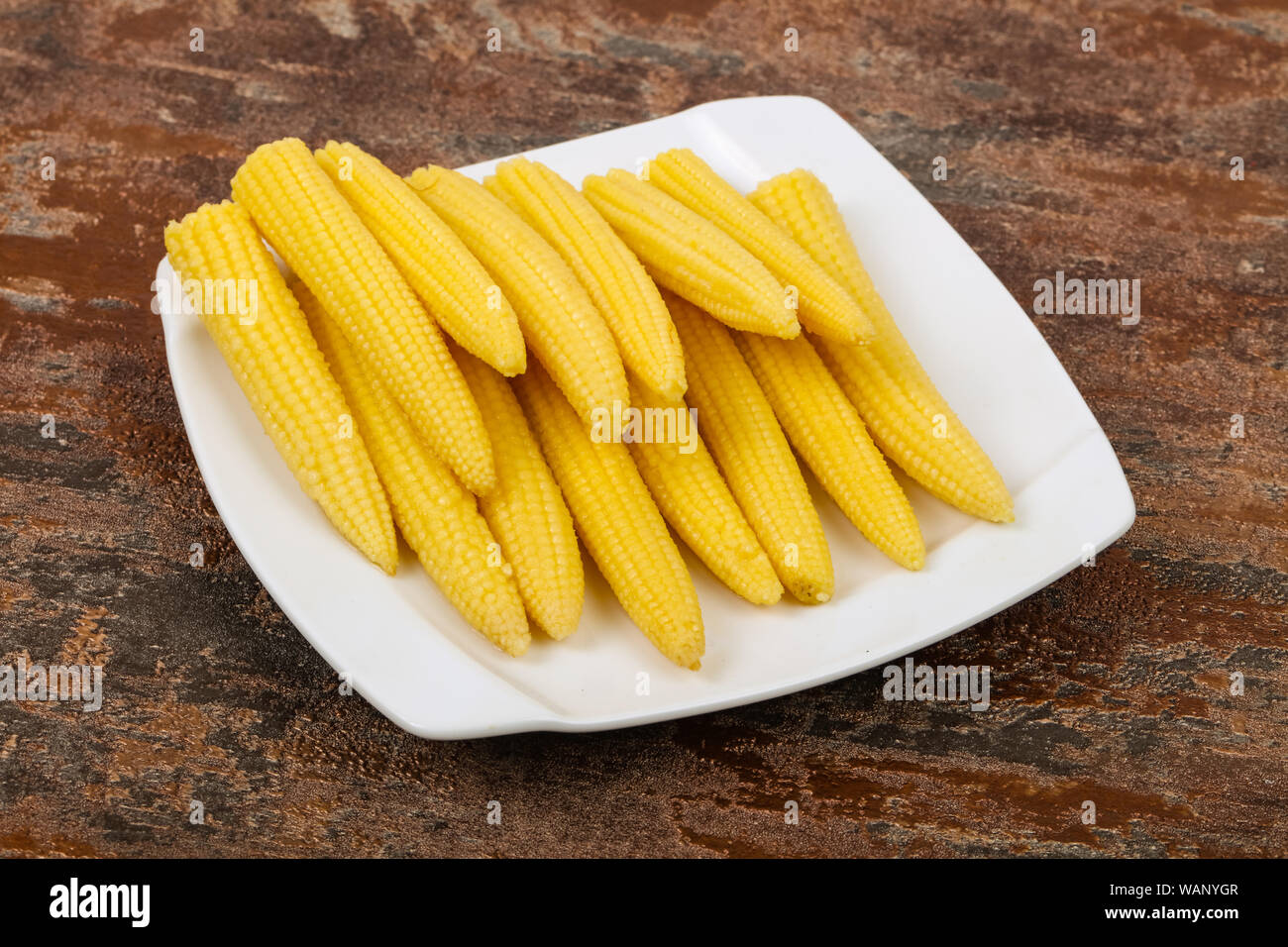 Pickled baby corn in the bowl Stock Photo Alamy