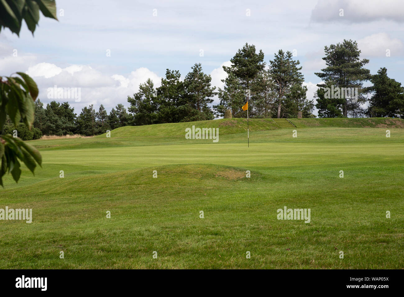 Putting green on a heath land golf course in West Yorkshire in late summer Stock Photo