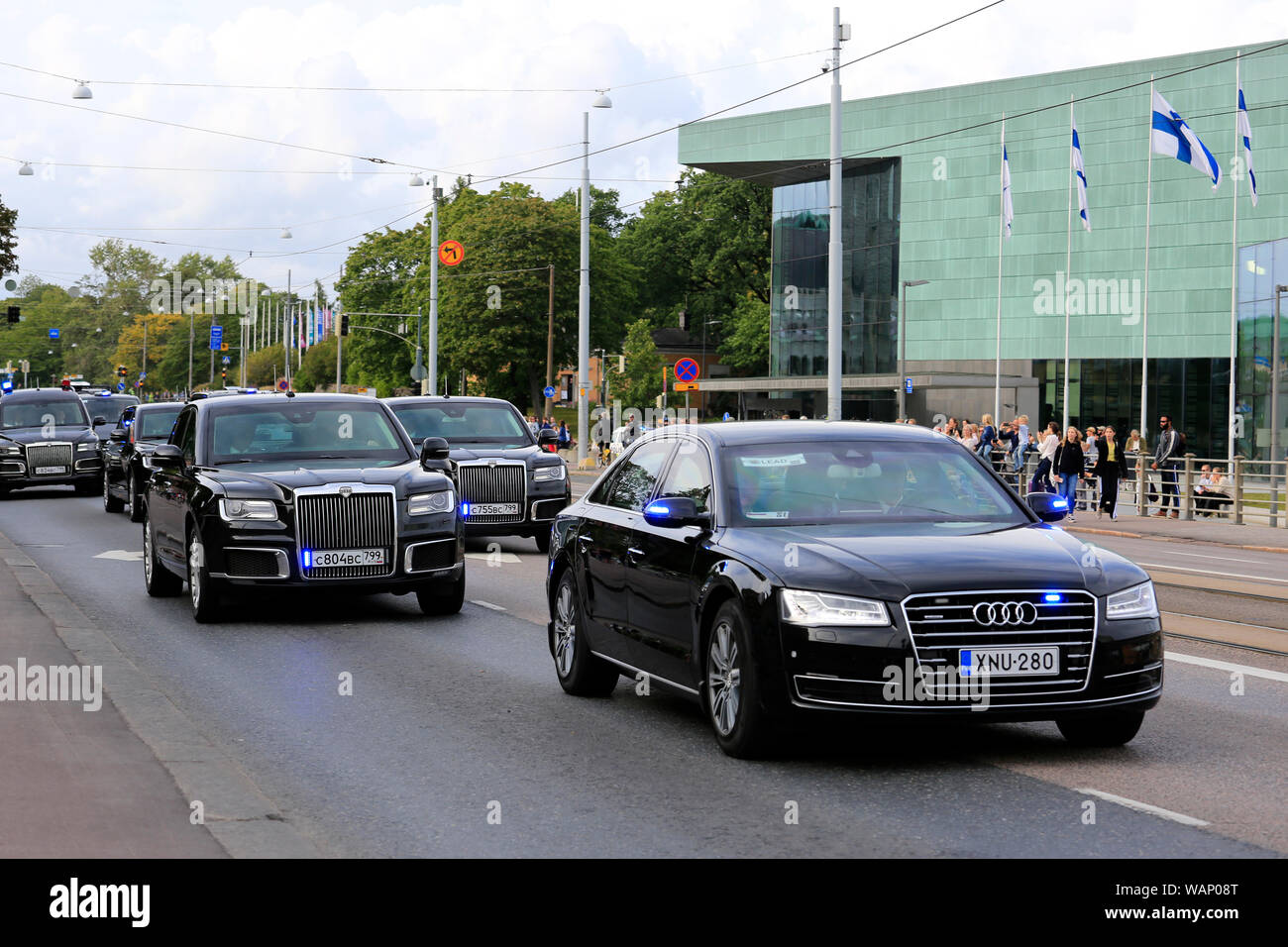 Helsinki, Finland. August 21, 2019. The presidential motorcade of Russian President Vladimir Putin passes along Mannerheimintie en route to official meeting with Finnish President Sauli Niinistö at the Presidential Palace. President Niinistö and President Putin will hold official discussions in the Presidential Palace, concluded by a dinner at the Suomenlinna Sea Fortress. Credit: Taina Sohlman/Alamy Live News Stock Photo