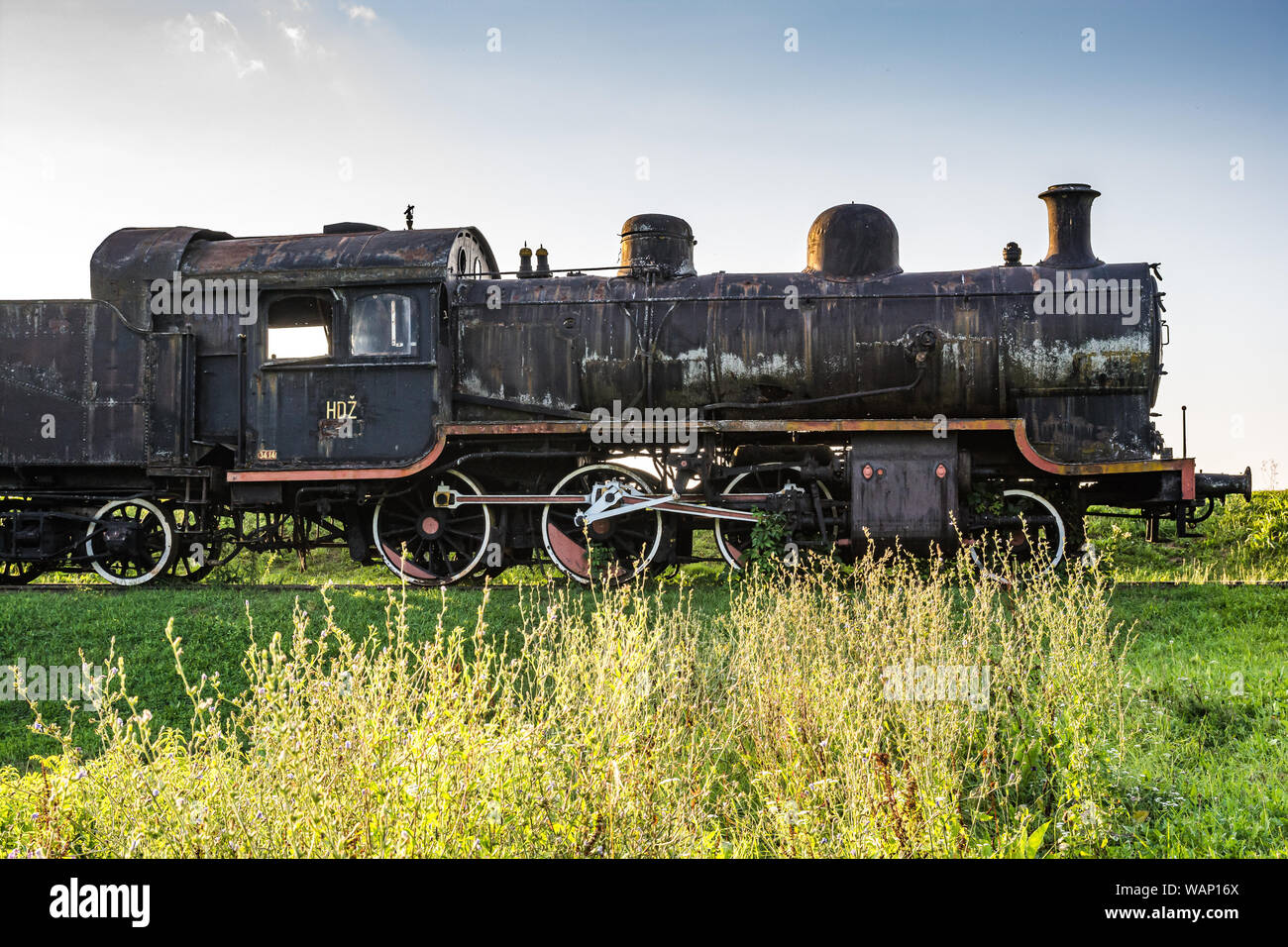 Jasenovac, Croatia - July 14, 2019. Old train in areal of memorial and museum of holocaust Stock Photo