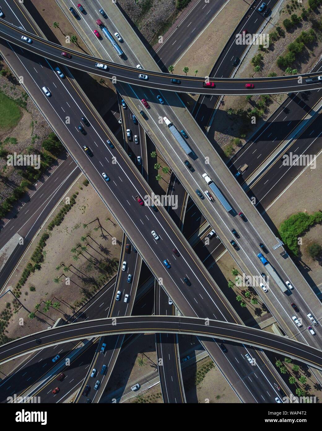Overhead drone shot of a busy highway intersection full of traffic during  daytime Stock Photo - Alamy