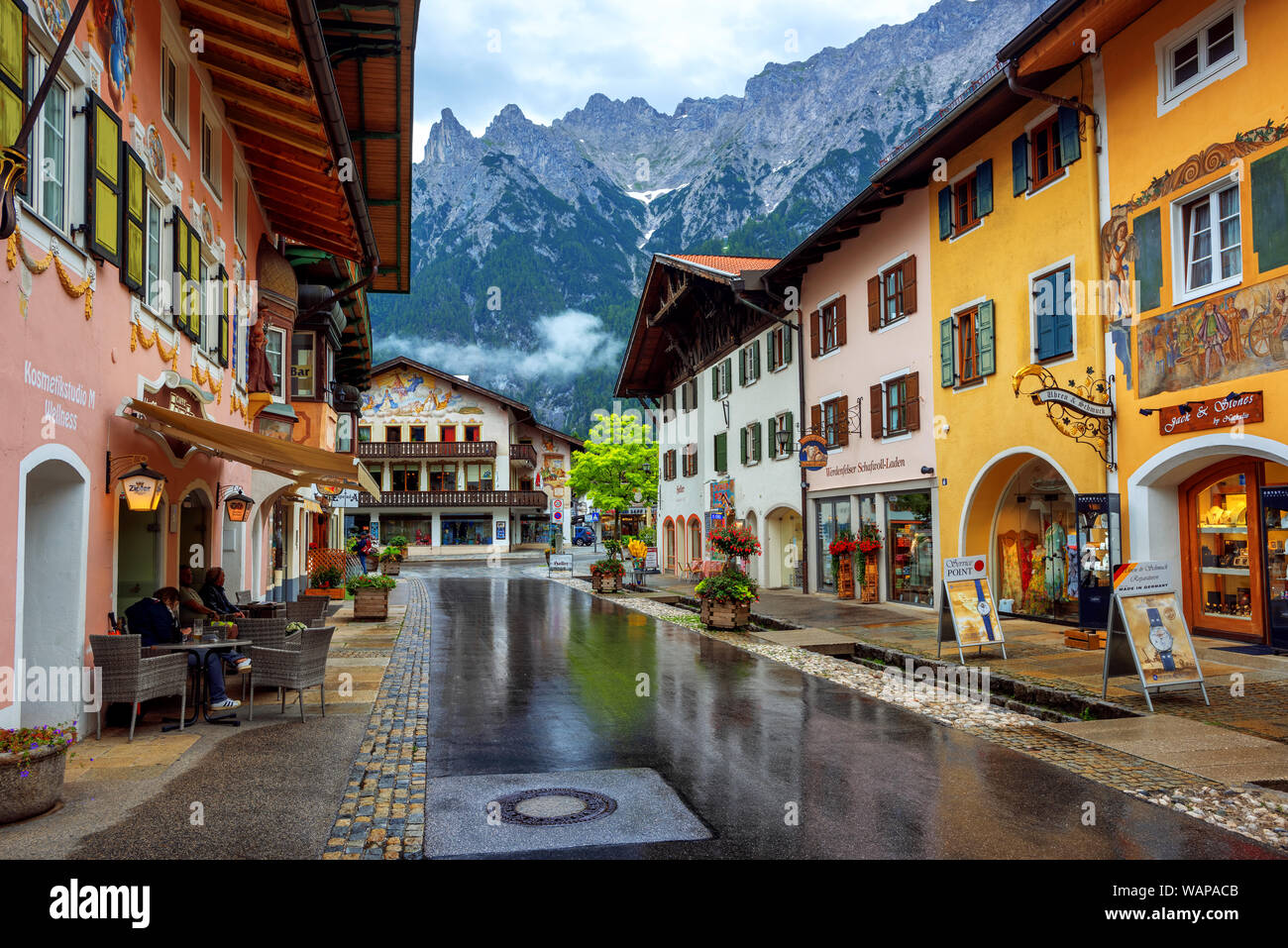 Mittenwald, Germany - 11 July 2019: Colorful painted houses in the Old town of Mittenwald, a popular tourist destination in Alps mountains, Bavaria Stock Photo