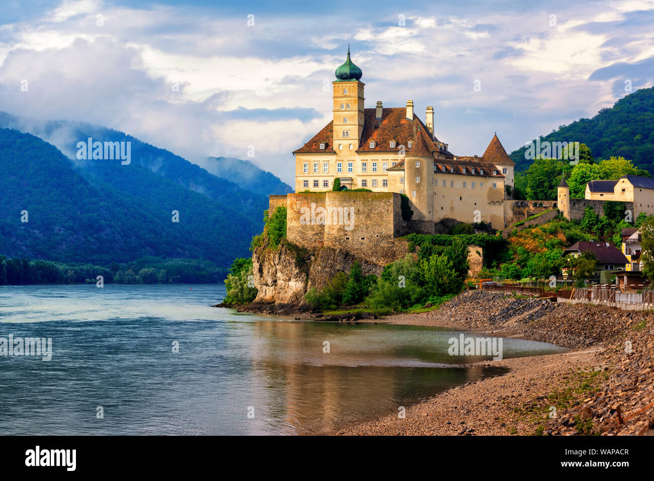 The medieval Schonbuhel castle, built on a rock on Danube river is a main historical landmark and popular tourist attraction in Wachau valley, a UNESC Stock Photo