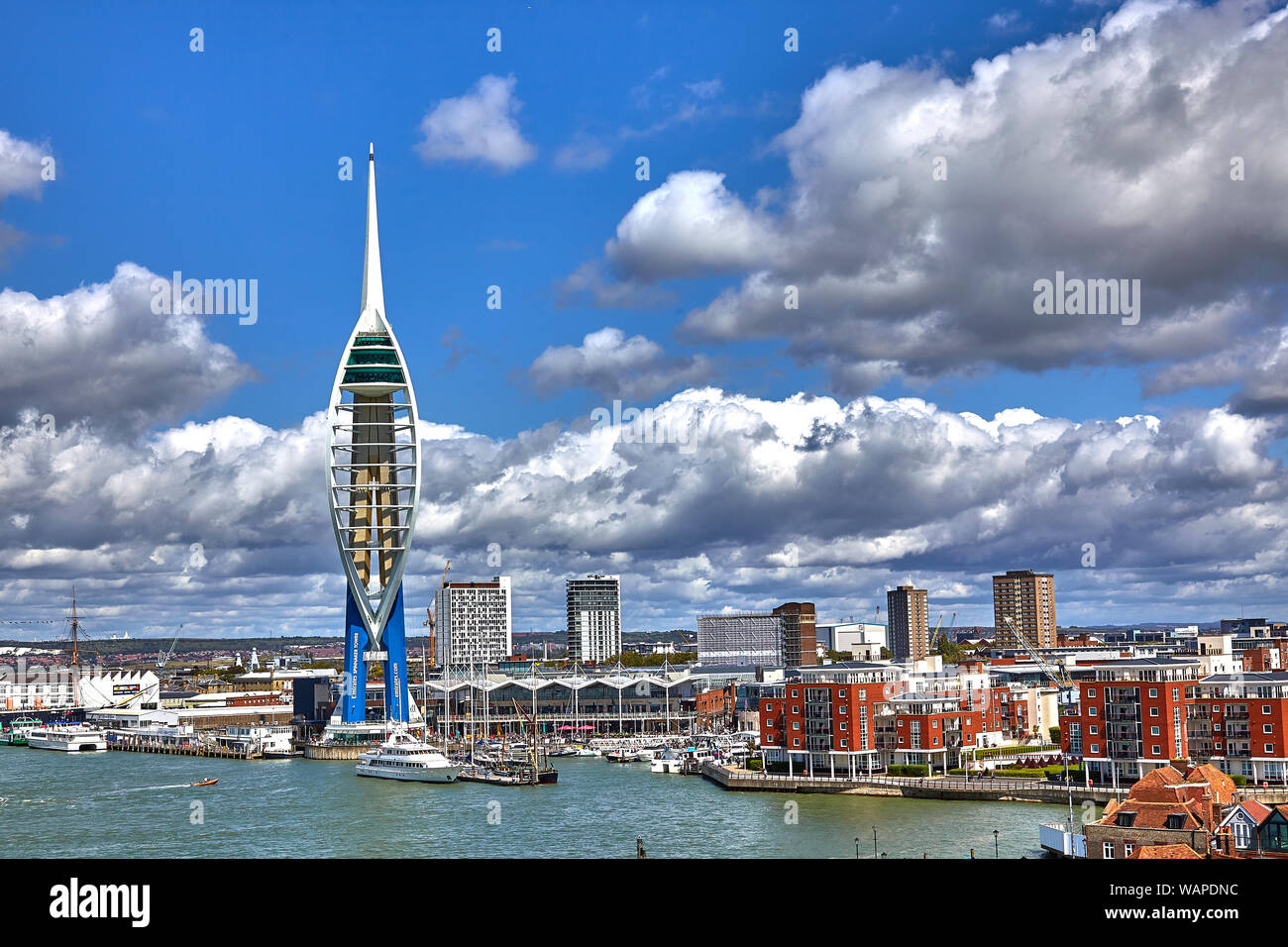 Portsmouth Harbour is a large natural harbour in Hampshire, England. It is best known as the home of the Royal Navy, HMNB Portsmouth Stock Photo
