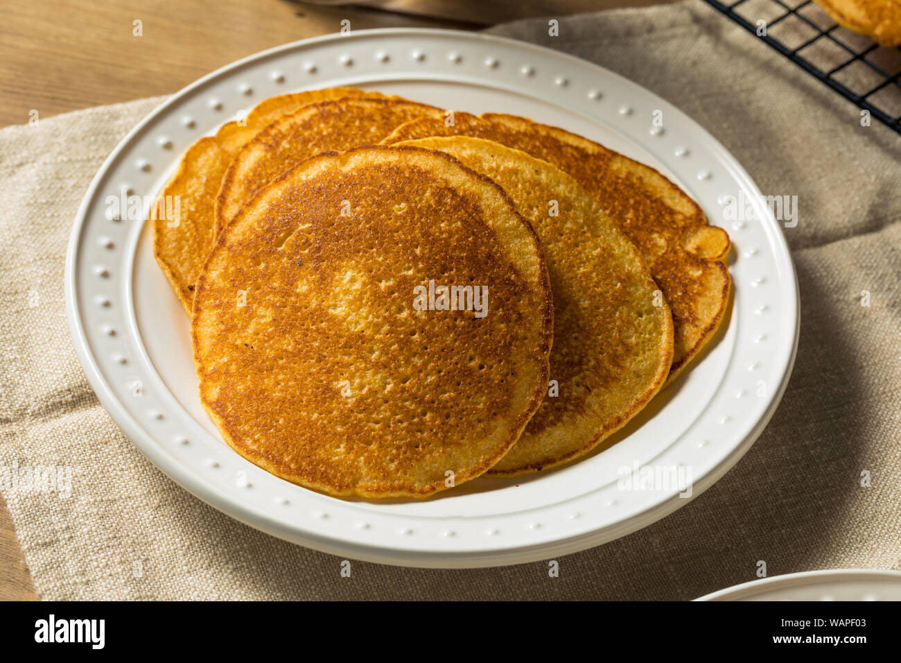 Homemade Corn Meal Johnny Cakes with Butter and Syrup Stock Photo Alamy
