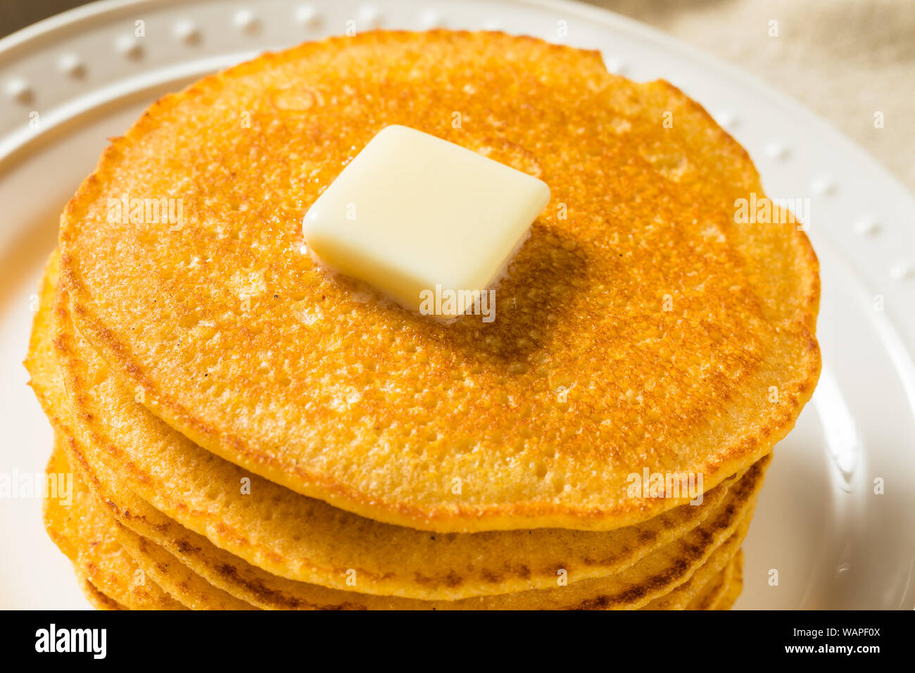 Homemade Corn Meal Johnny Cakes with Butter and Syrup Stock Photo Alamy