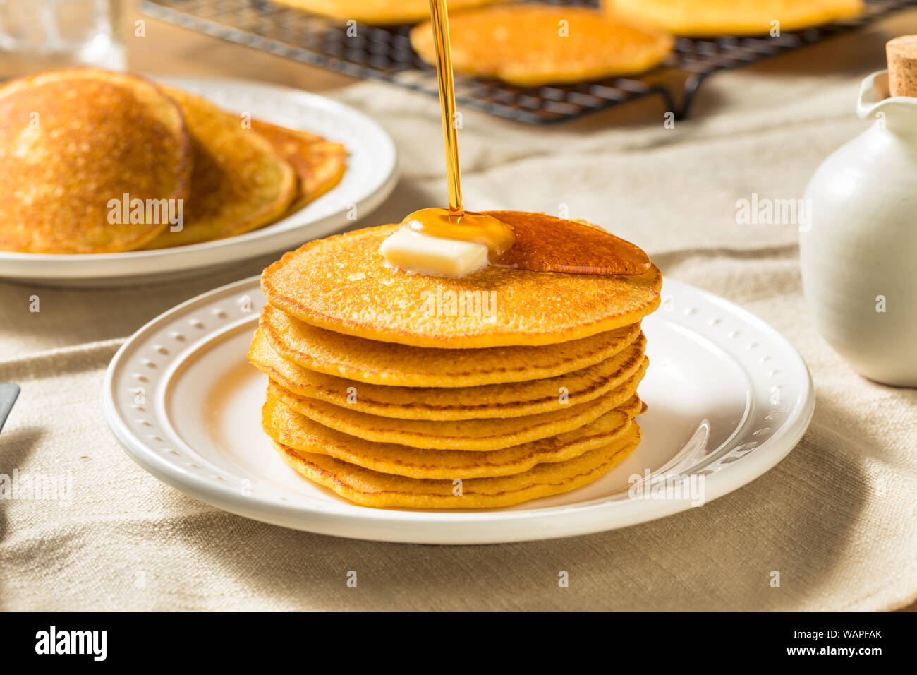 Homemade Corn Meal Johnny Cakes with Butter and Syrup Stock Photo Alamy