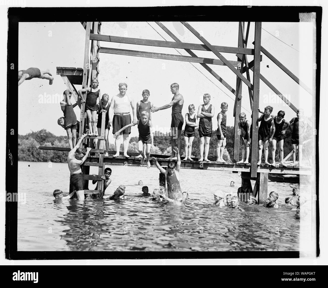Davis, swimming, Moosehead Stock Photo