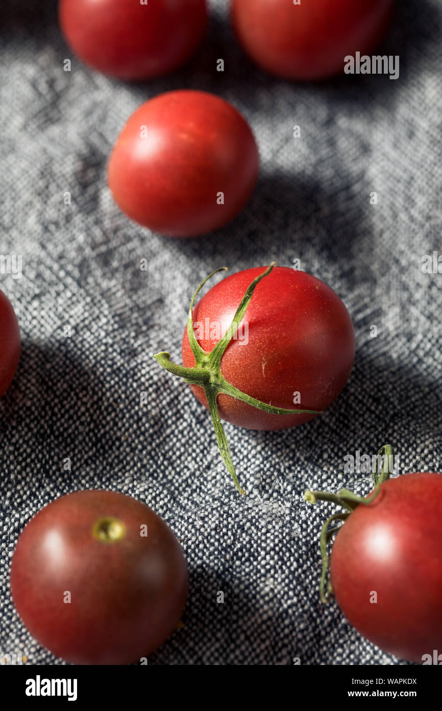Raw Red Heirloom Cherry Tomatoes in a Bowl Stock Photo - Alamy