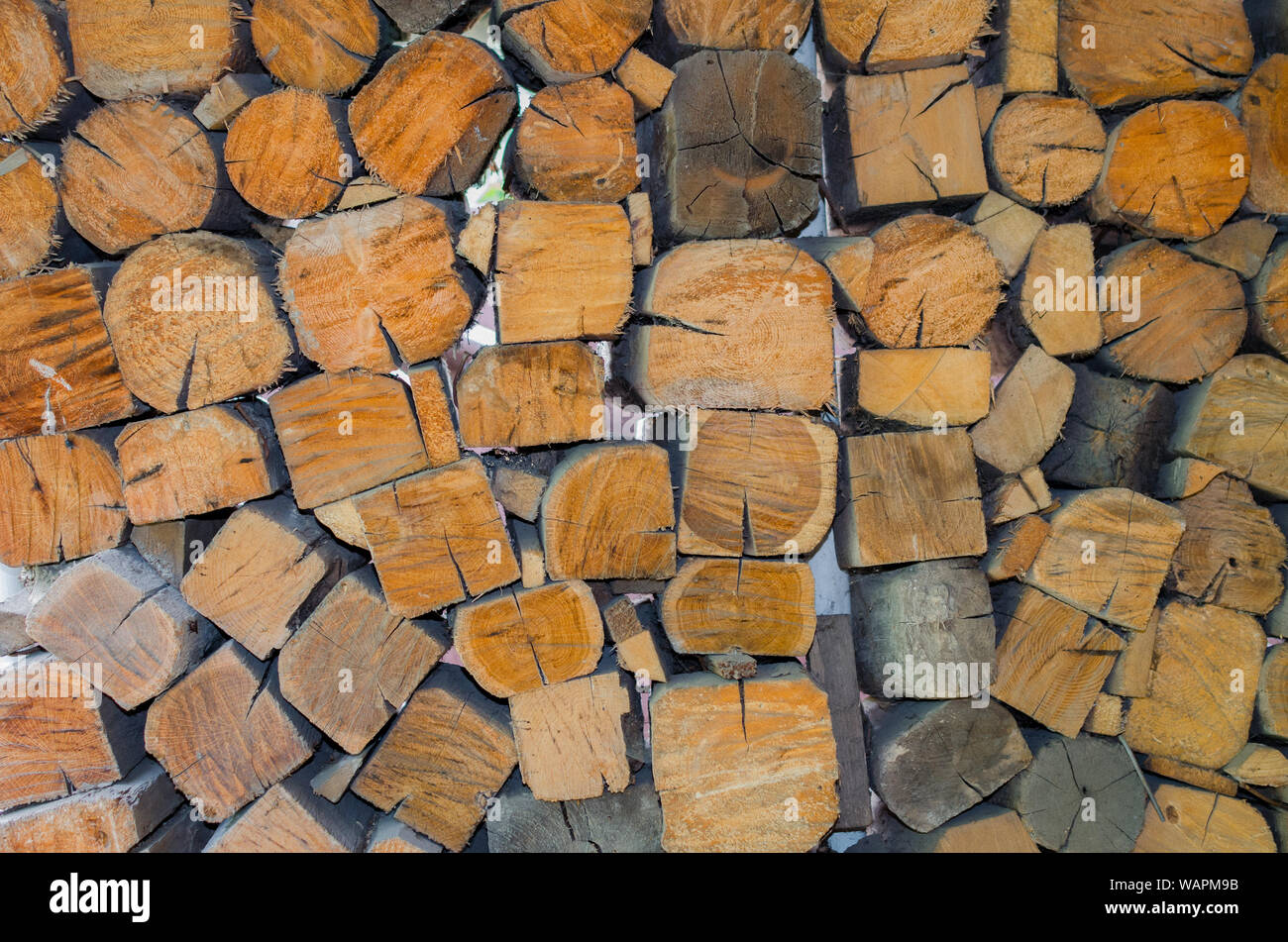 Background, texture of the wall from the folded logs. Stock Photo