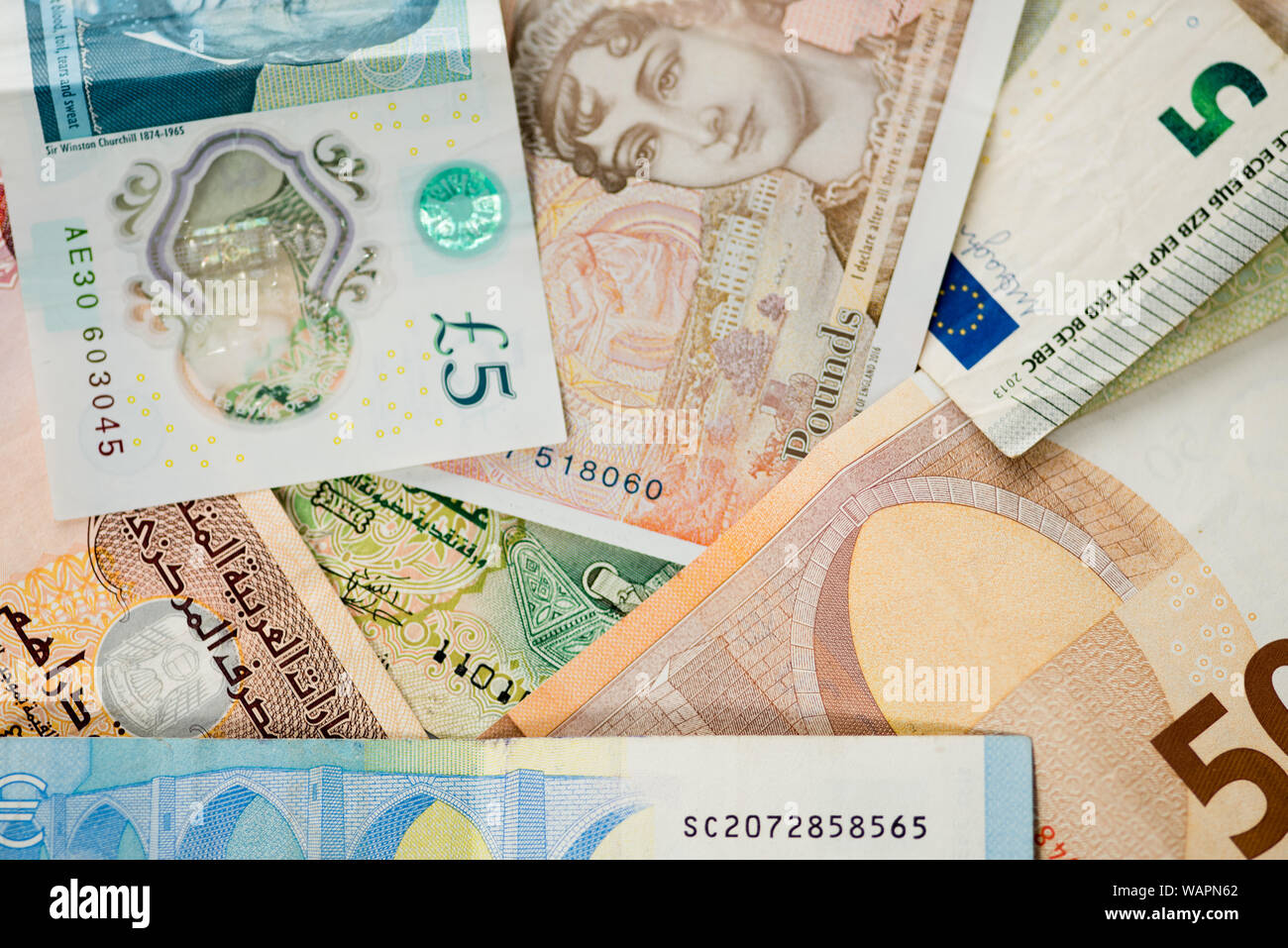 Pounds and Euros of various denominations at a closeup Stock Photo