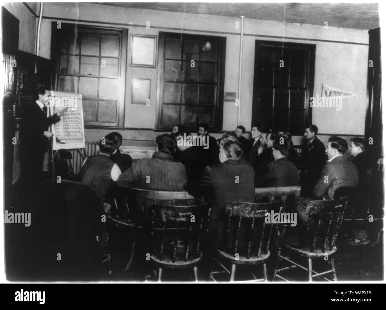 Department of Labor, training service. Italian class receiving instruction in English and citizenship, Newark, N.J. Y.M.C.A. Stock Photo