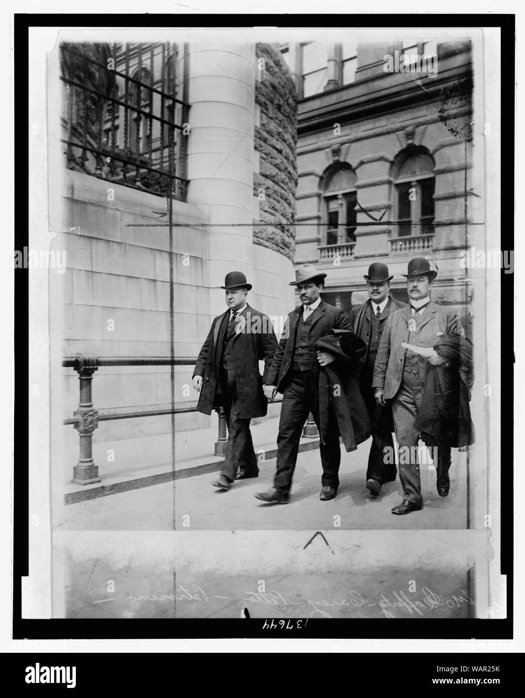 Detective Lt. Joseph Petrosiino( left) , Inspector Carey and Inspector McCafferty escorting Mafia hitman Petto the Ox (Tomasso Petto, second from left) Stock Photo