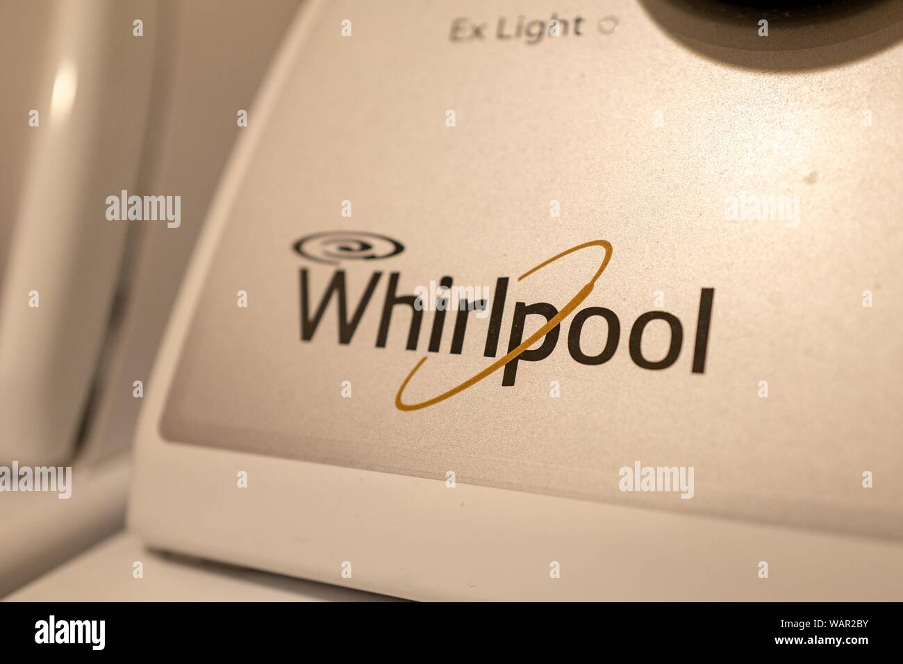 Close-up of logo for Whirlpool on clothes washing machine in a domestic room, August 21, 2019. () Stock Photo