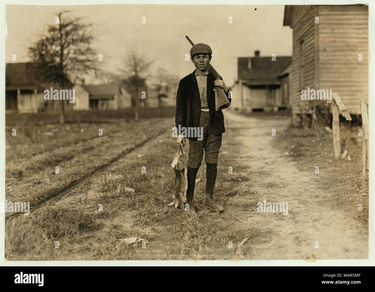 Dillon (S.C.) Mills. Charley Baxley. Has doffed 4 years. Gets 50 cents. Had been out hunting. Abstract: Photographs from the records of the National Child Labor Committee (U.S.) Stock Photo