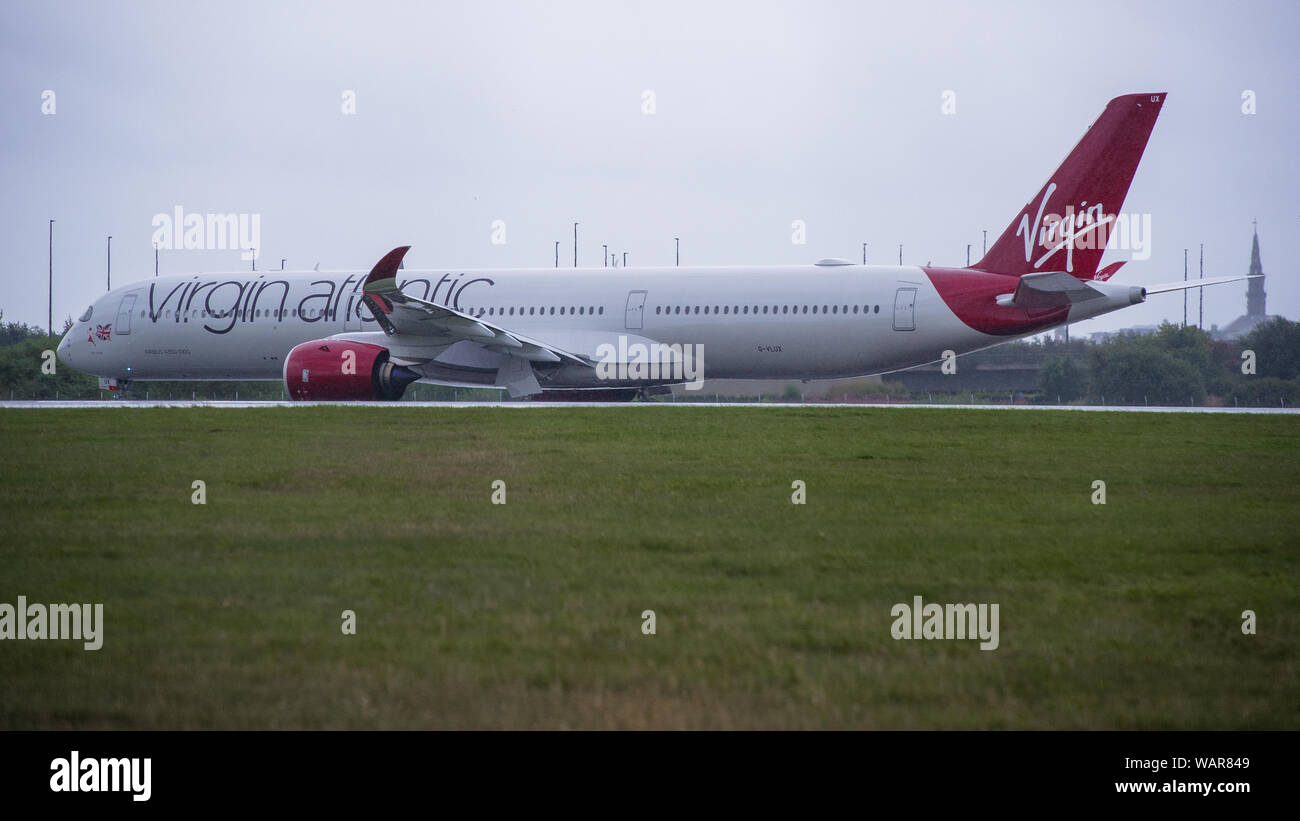 Glasgow, UK. 21 August 2019. Virgin Atlantic Airbus A350-1000 aircraft seen at Glasgow International Airport for pilot training. Virgin's brand new jumbo jet boasts an amazing new 'loft' social space with sofas in business class, and aptly adorned by the registration G-VLUX. The entire aircraft will also have access to high-speed Wi-Fi. Virgin Atlantic has ordered a total of 12 Airbus A350-1000s. They are all scheduled to join the fleet by 2021 in an order worth an estimated $4.4 billion (£3.36 billion). The aircraft also promises to be unto 30% more fuel efficient saving on CO2 emissions. Stock Photo
