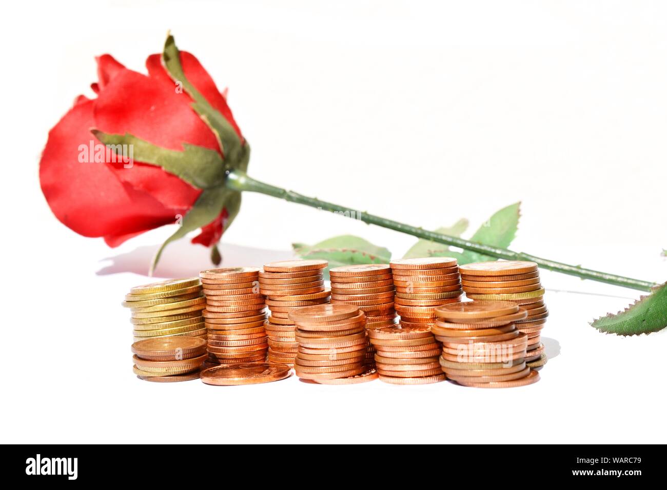 Many stacks of coins in various sizes and valued,Copper and gold color ...