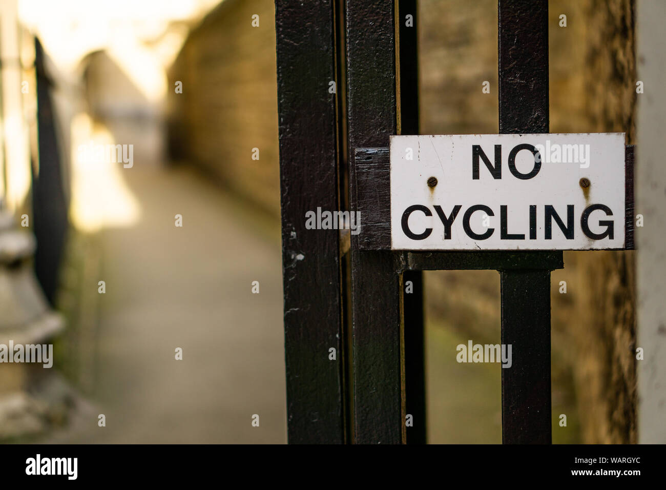 No Cycling Sign With Footpath Behind Stock Photo