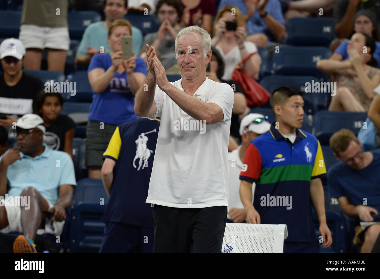 Flushing NY, USA. 21st Aug, 2019. John McEnroe Vs Jim Courier during the Legends match on Louis Armstrong Stadium at the USTA Billie Jean King National Tennis Center on August 21, 2019 in Flushing Queens. Credit: Mpi04/Media Punch/Alamy Live News Stock Photo