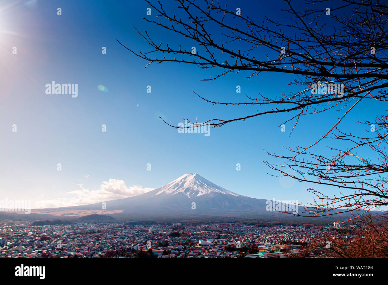 Mount Fuji with snow and blue sky with Shimoyoshida city seen from Chureito Pagoda Arakurayama Sengen Park in Fujiyoshida near Kawaguchigo Stock Photo