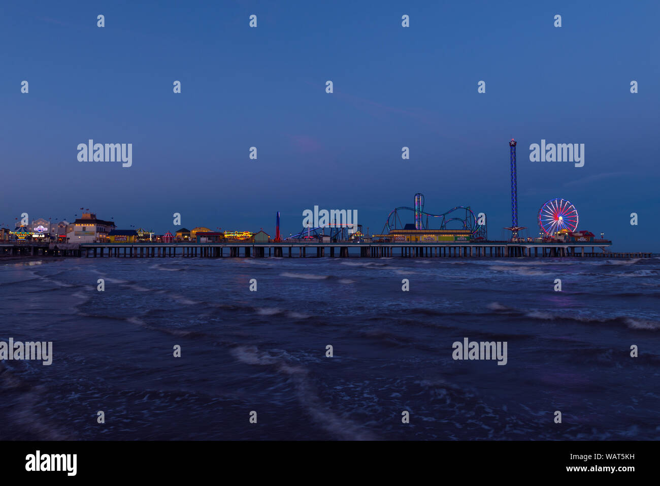 Dusk shot of the Galveston Island Historic Pleasure Pier, an amusement
