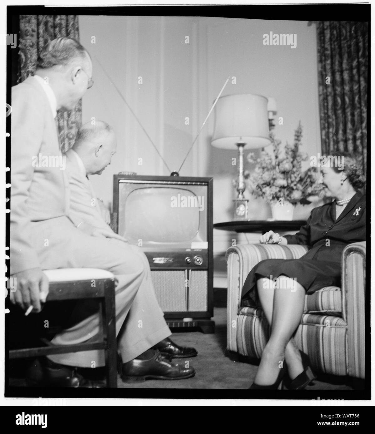 Dwight and Mamie Eisenhower watching a television; English: Dwight and Mamie Eisenhower watching a television during the Republican National Convention, Chicago, Illinois Stock Photo