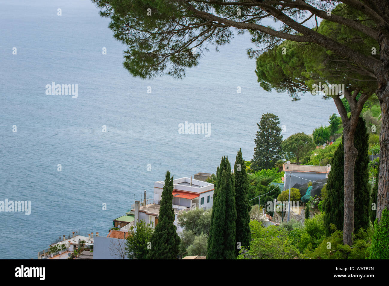 Buildings Above the Sea Seen from the Garden of Villa Rufolo, historic center of Ravello, Amalfi Coast of Italy Stock Photo