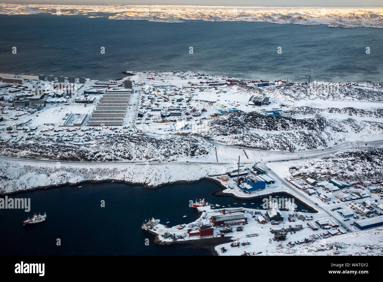 Aerial view to the fjord, port and snow streets of Greenlandic capital
