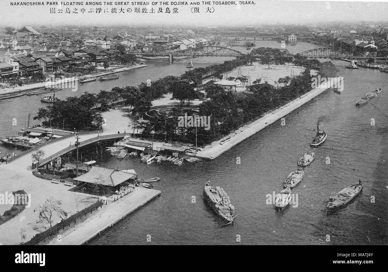 [ 1930s Japan - Nakanoshima Park, Osaka ] —   Opened in 1891 (Meiji 24), Nakanoshima Park was Osaka’s very first public park. It was built on Nakanoshima, a small stretch of land that divides the old Yodo River into the Dojima River and the Tosabori River.   During the Edo Period the banks of these two rivers were lined with Kurayashiki, the warehouses and residences of samurai who sold goods from their domains in Osaka. But by the end of the 19th century, the area was quickly shedding its Edo face and Nakanoshima became the focus of Osaka’s modernization.  20th century vintage postcard. Stock Photo