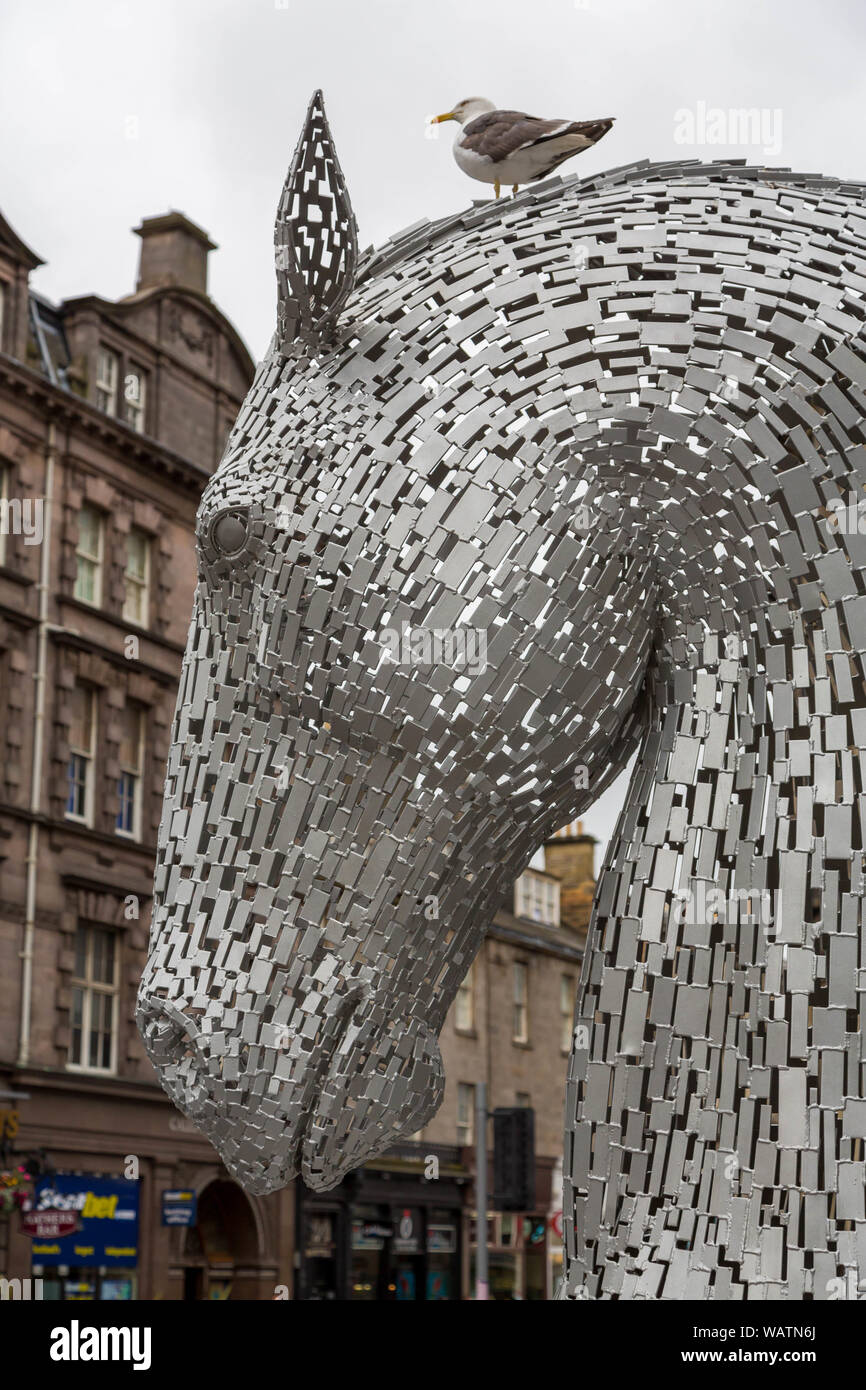 Edinburgh, Scotland -9th August 2015: The Kelpies statue in the street in Edinburgh. These are advertising the giant version which is outside of town. Stock Photo