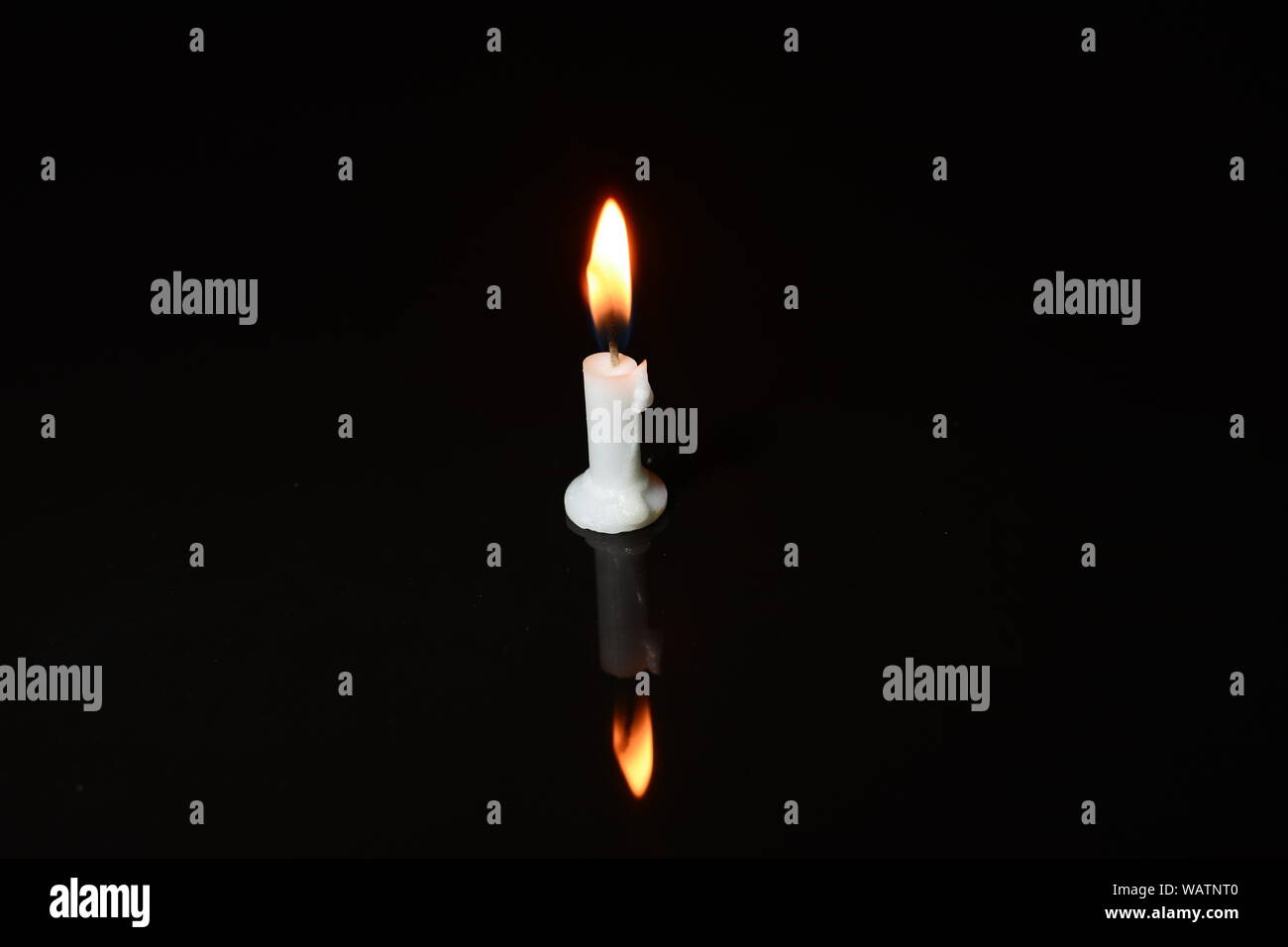 Candle flame close up on a black background Stock Photo - Alamy