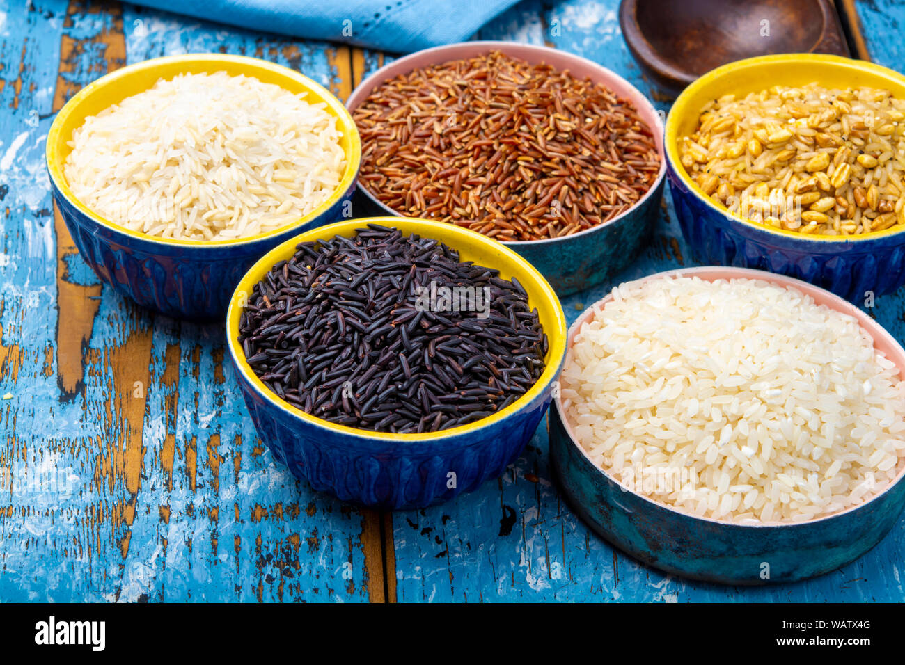 Different types of rice, white basmati, jasmine, arborio, brown and black, rice collection Stock
