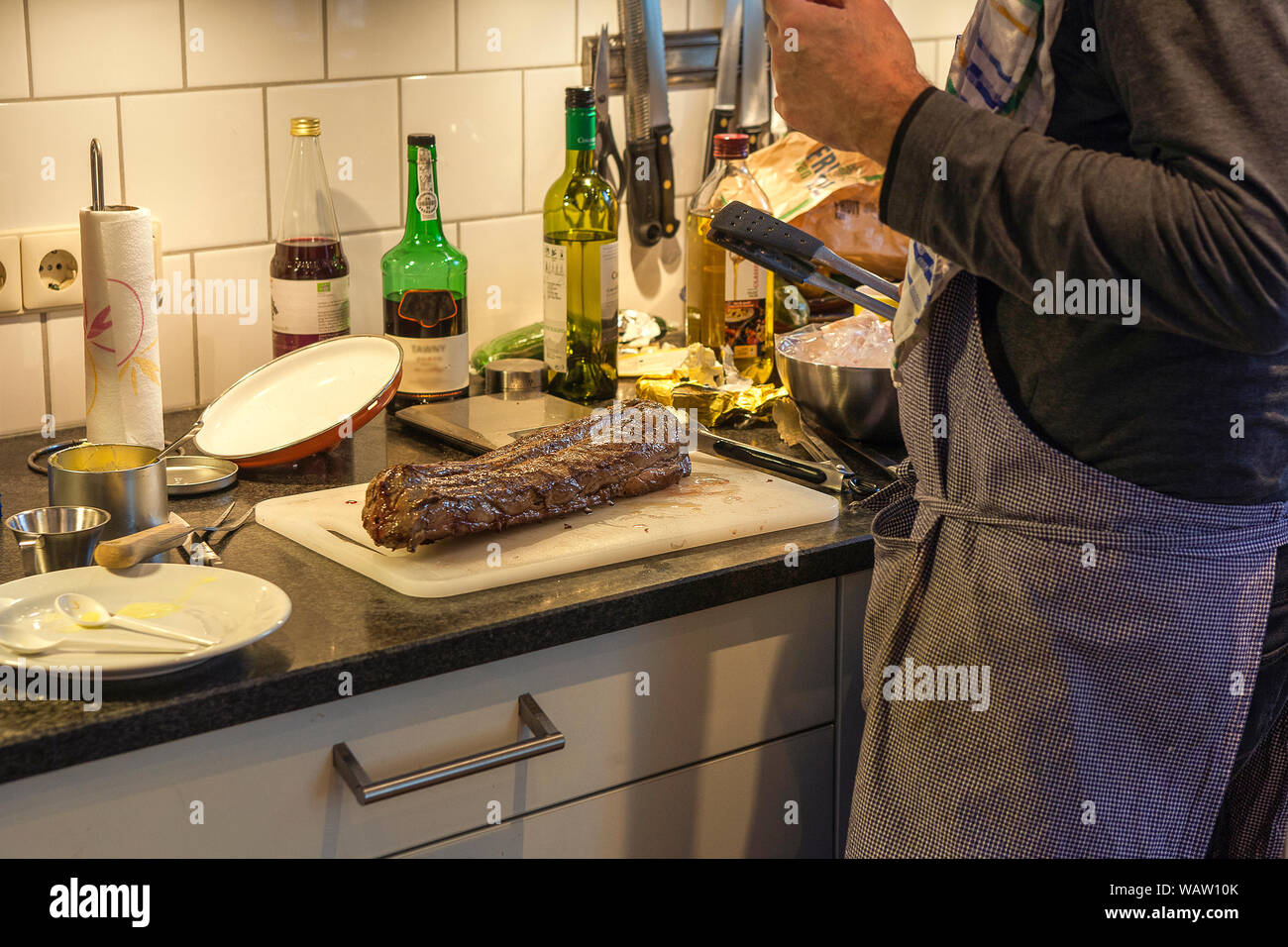 Cooking a roe in the kitchen at home for christmas Stock Photo