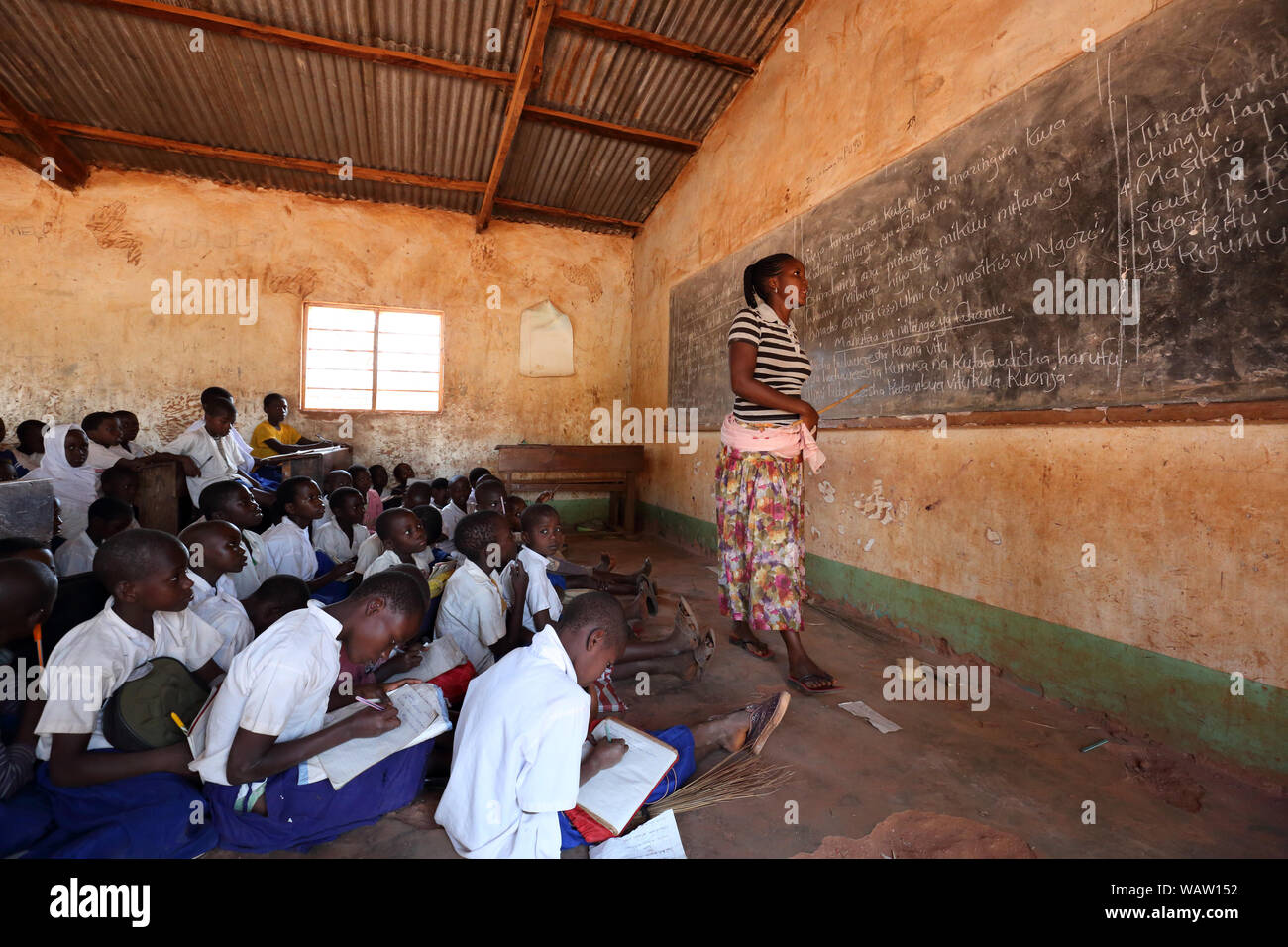 Students in primary school in Kigoma, Tanzania. Tanzania has still an alarming drop-out rate of students in primary school Stock Photo