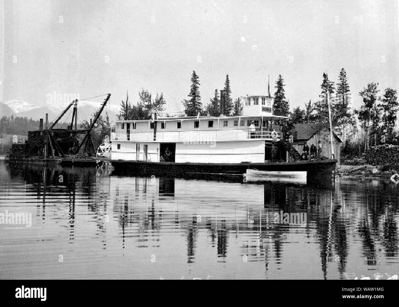 Duchess (sternwheeler) on Columbia River BC with Mudlark (clamshell dredge) 1898. Stock Photo