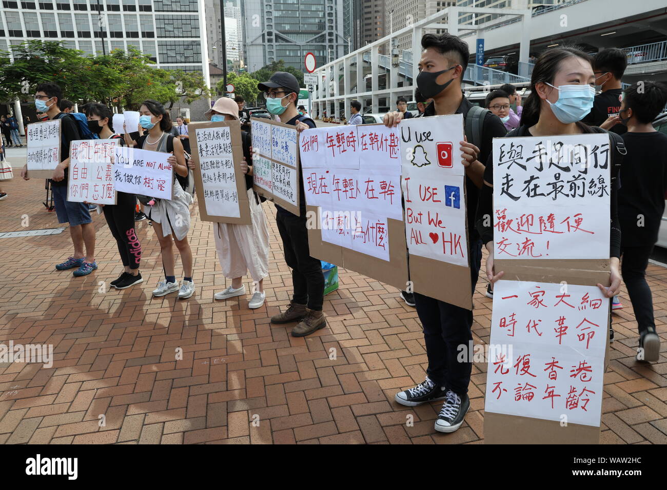 Hong Kong. 22nd Aug, 2019. 22nd August 2019. Hong Kong Secondary School Students Anti Extradition Bill protest in Central Hong Kong. Many hundreds of secondary school gathered for a rally in the blazing hot sun in support of Anti Extradition Bill protests which have been ongoing throughout Hong Kong for the past couple of months. Credit: David Coulson/Alamy Live News Stock Photo