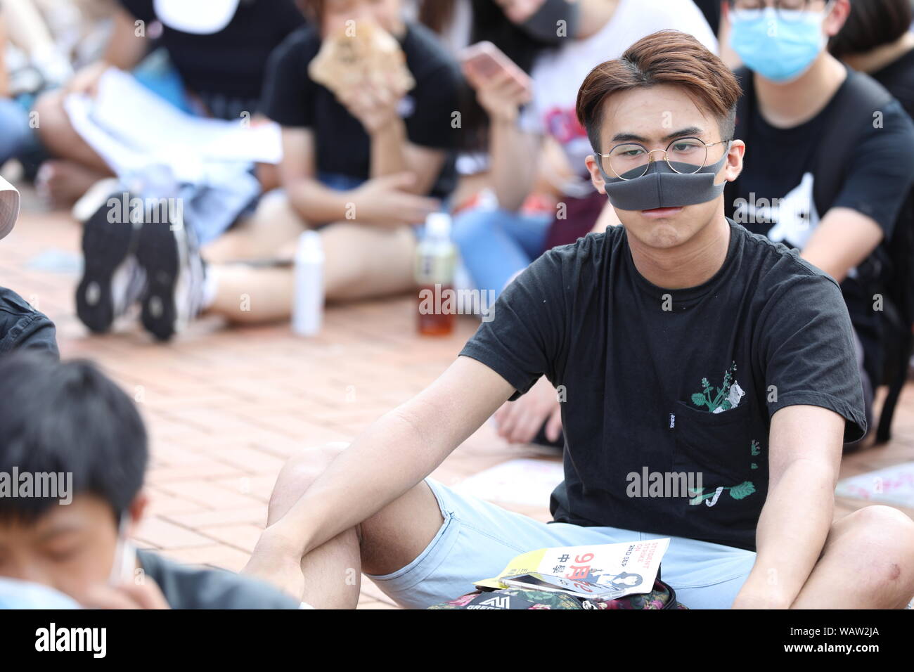 Hong Kong. 22nd Aug, 2019. 22nd August 2019. Hong Kong Secondary School Students Anti Extradition Bill protest in Central Hong Kong. Many hundreds of secondary school gathered for a rally in the blazing hot sun in support of Anti Extradition Bill protests which have been ongoing throughout Hong Kong for the past couple of months. Credit: David Coulson/Alamy Live News Stock Photo