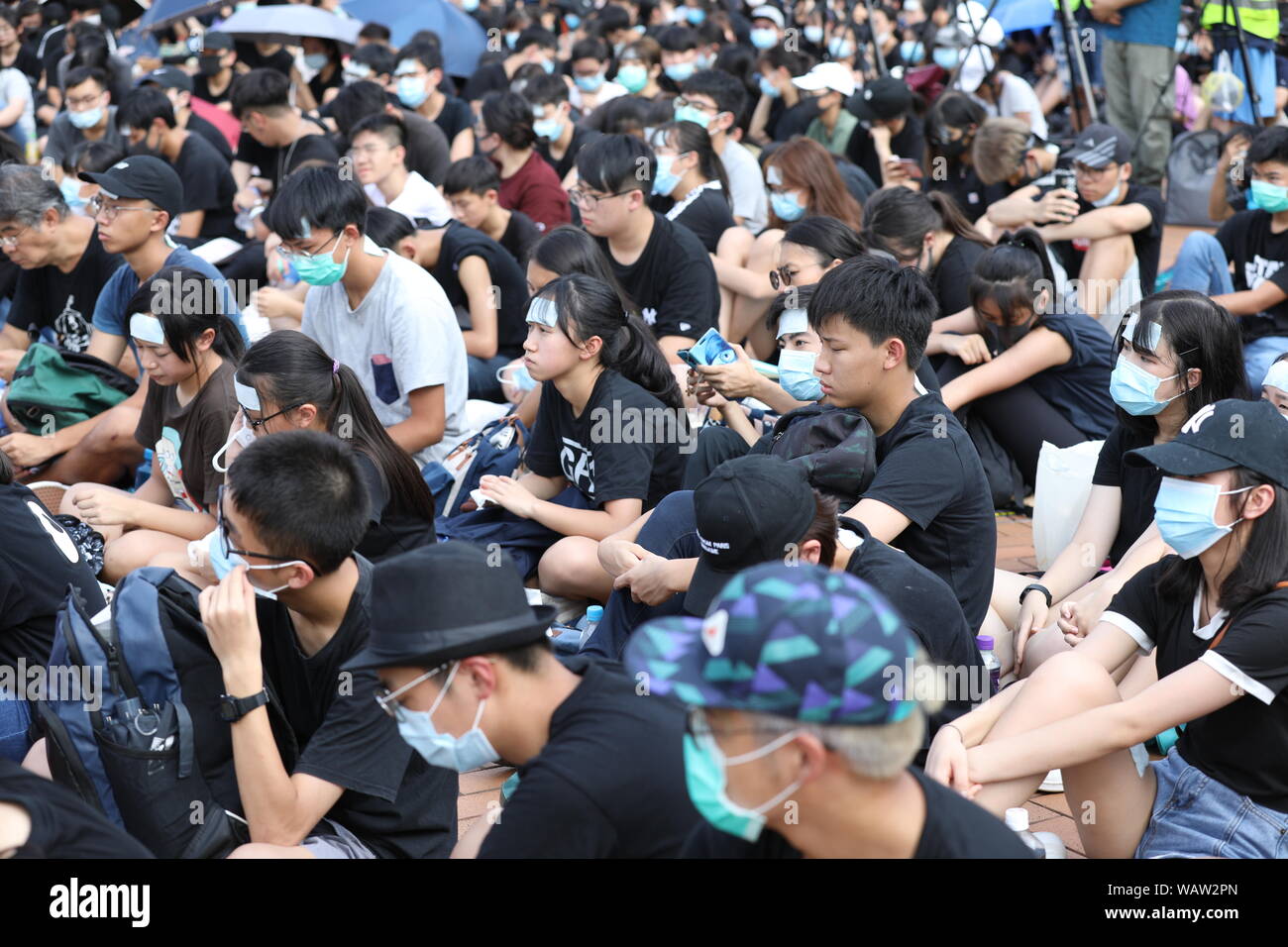 Hong Kong. 22nd Aug, 2019. 22nd August 2019. Hong Kong Secondary School Students Anti Extradition Bill protest in Central Hong Kong. Many hundreds of secondary school gathered for a rally in the blazing hot sun in support of Anti Extradition Bill protests which have been ongoing throughout Hong Kong for the past couple of months. Credit: David Coulson/Alamy Live News Stock Photo