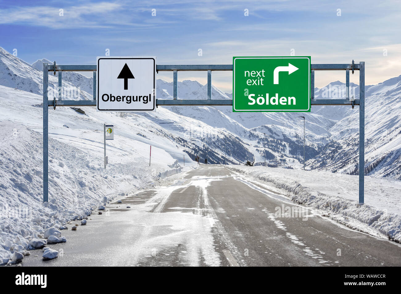 Austria ski town Obergurgl and Sölden road big sign with a lot of snow and mountain sky background Stock Photo