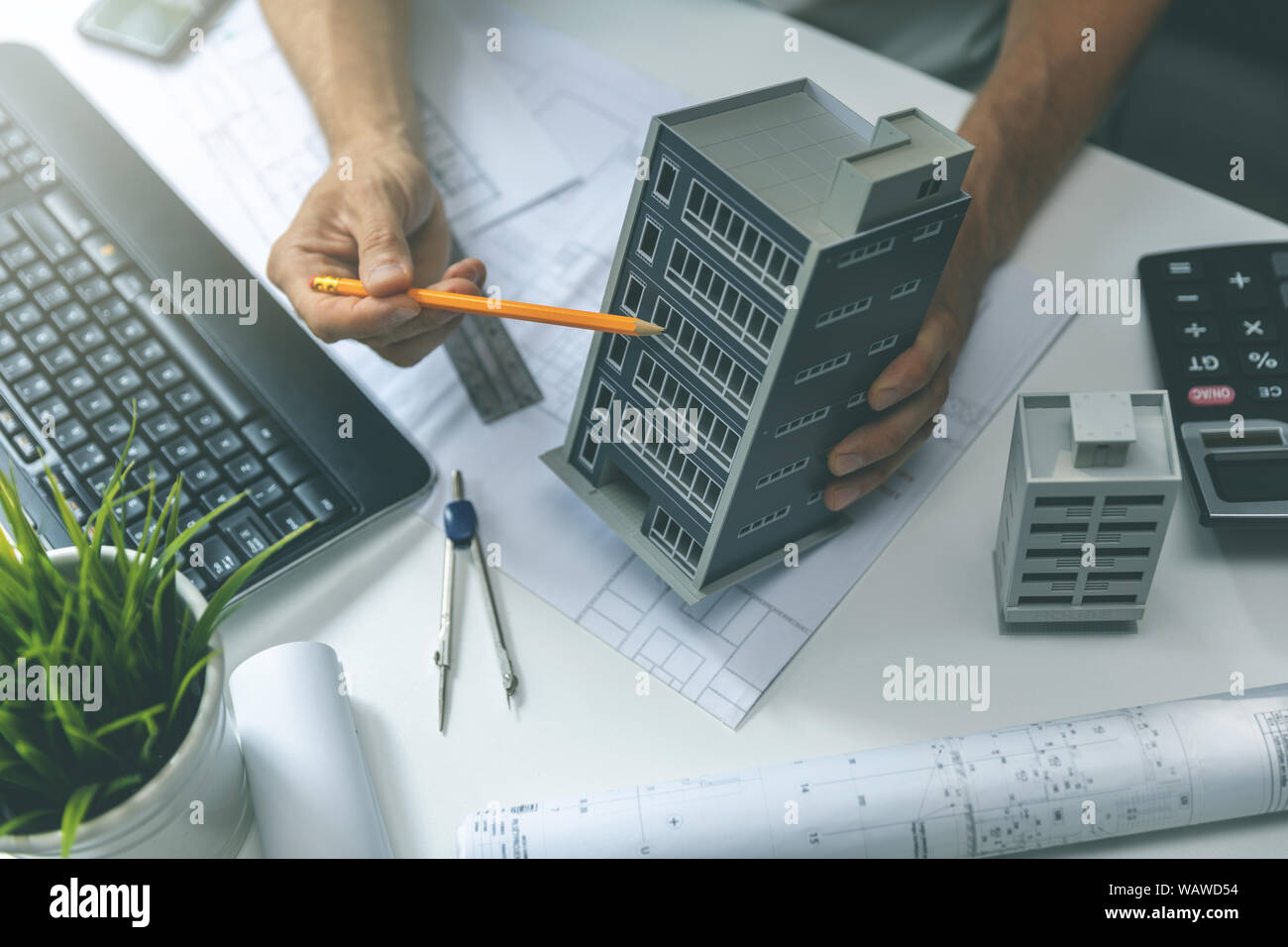 real estate development - construction engineer working on new house project in office Stock Photo