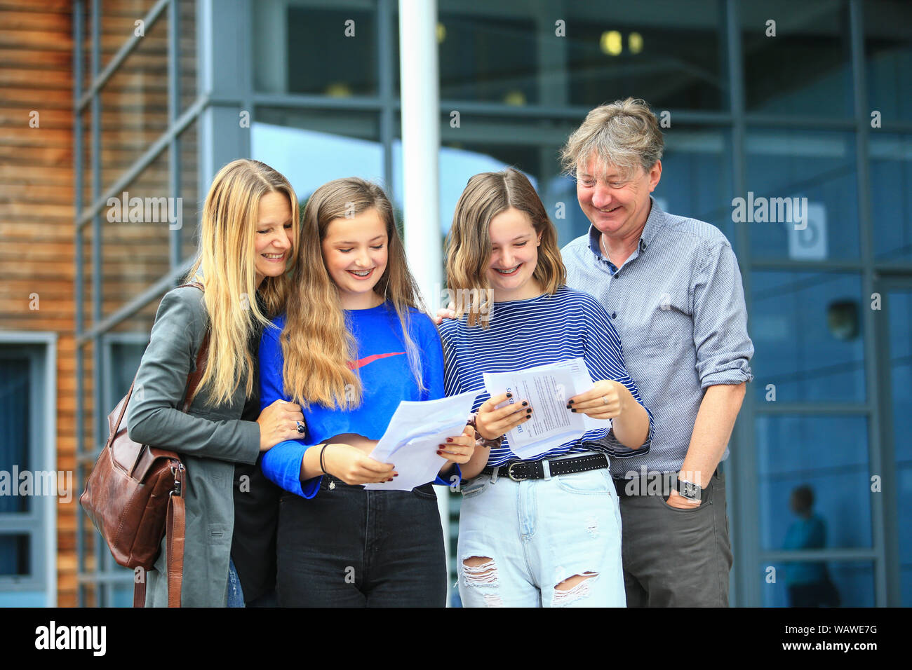 Gcse Exam Results Day Twin Students Open Their Results Letters In A School With Their Parents Stock Photo Alamy Gcse Exam Results Day Twin Students Open Their Results Letters In A School With Their Parents Stock Photo Alamy
