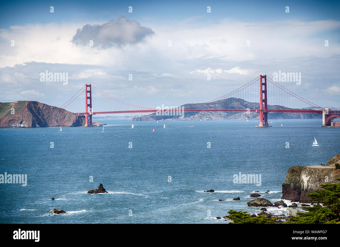 Sail boats in the San Francisco bay with the Golden Gate bridge in the background as taken from Lands End. Stock Photo