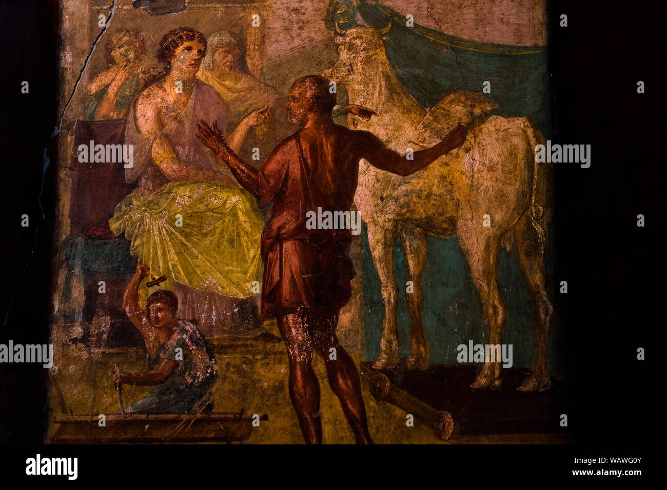 Pompeii, Italy Roman domus house of Vettii fresco painting. North wall triclinium mythological scene depicting Daedalus and Pasiphae. Stock Photo