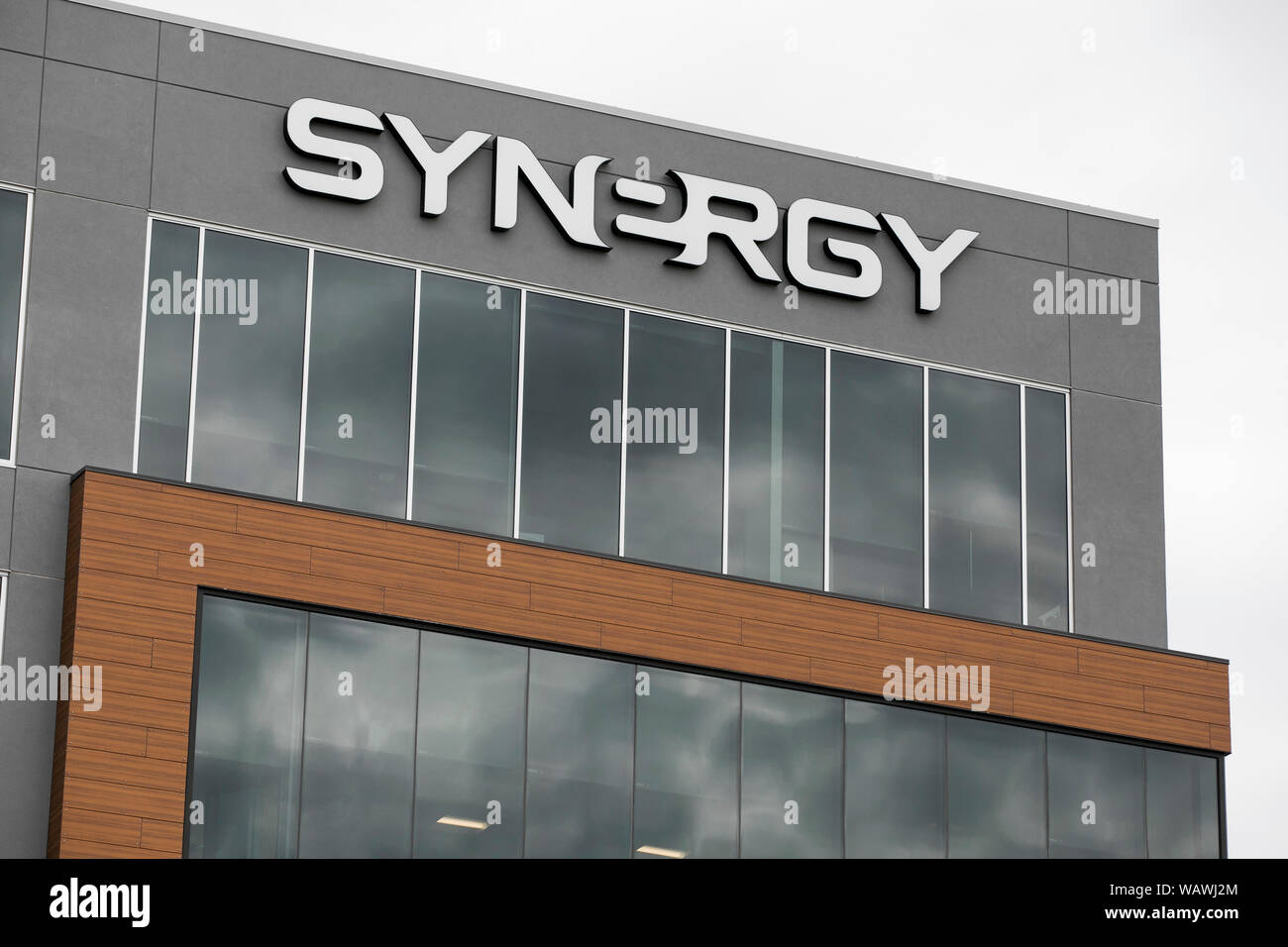 A logo sign outside of the headquarters of Synergy WorldWide in Lehi, Utah on July 27, 2019. Stock Photo