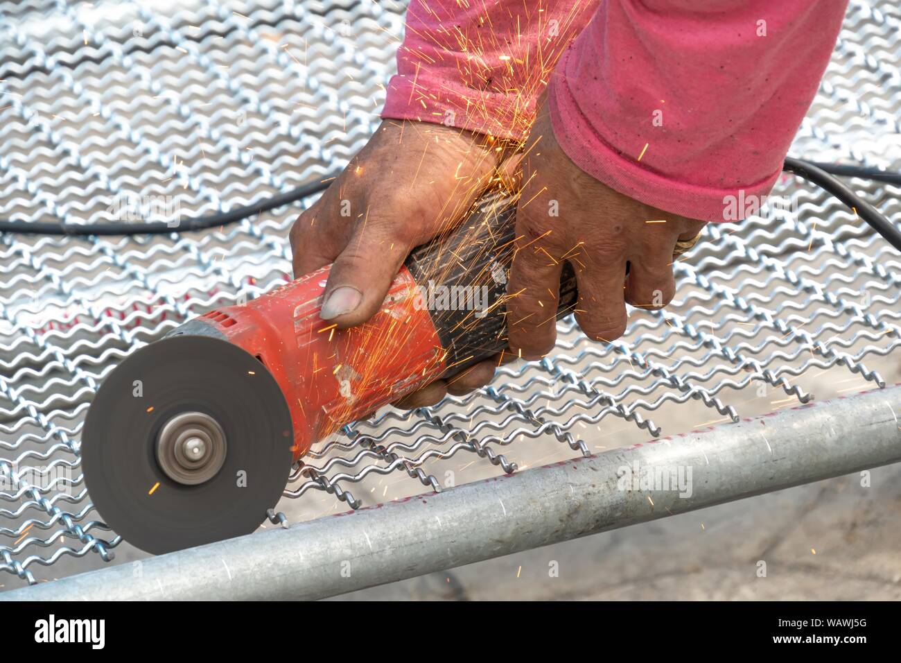 man used angle grinder without cover 
