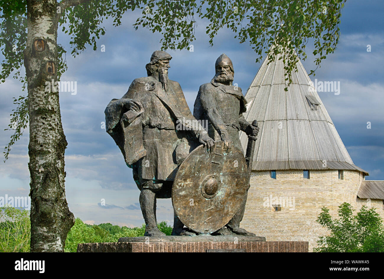Saint Petersburg, Staraya Ladoga, Russia - June 22, 2019: Monument to the two princes Rurik and Oleg, founding the old Russian state in the background Stock Photo